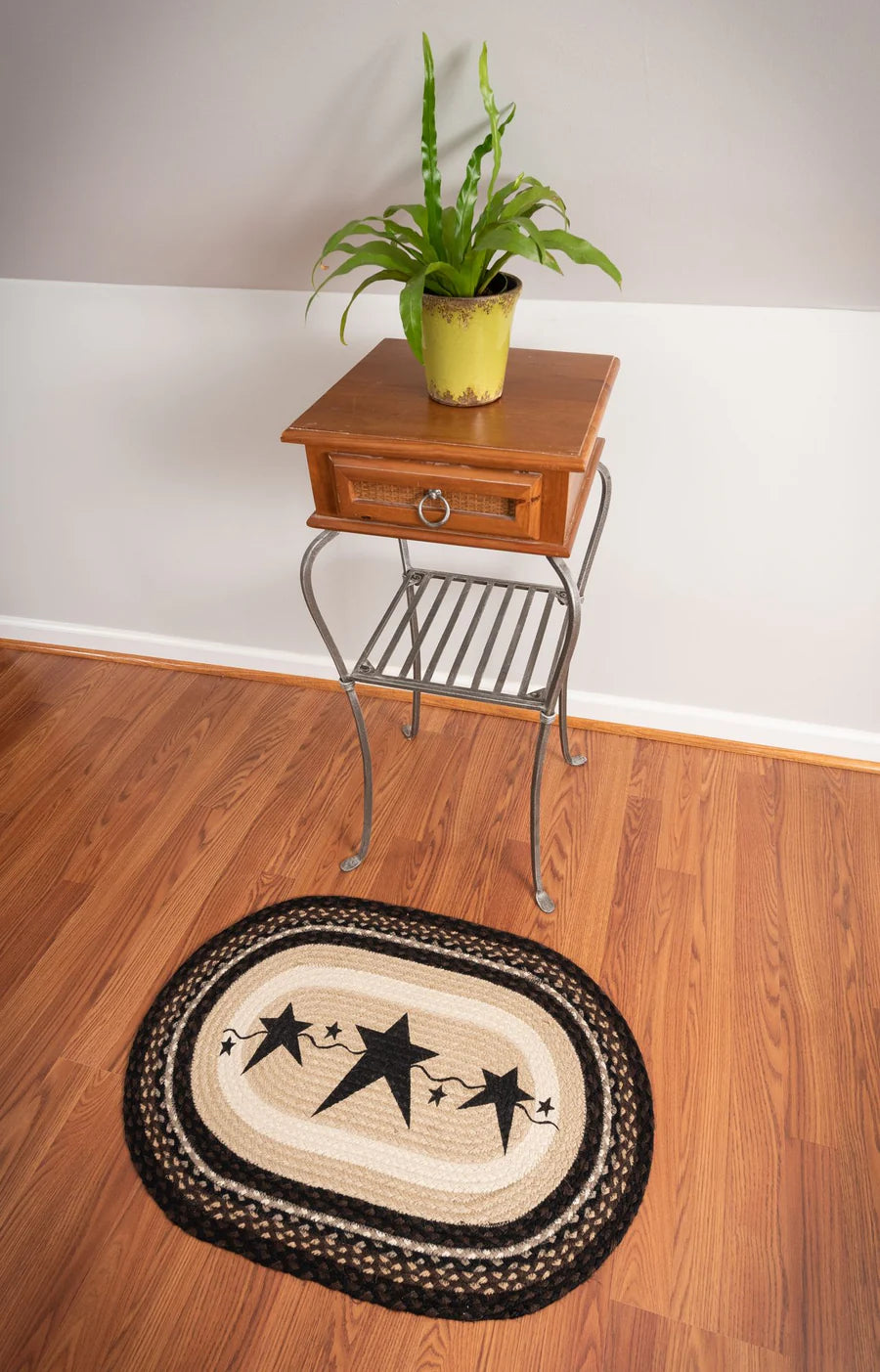 Primitive Stars Black oval braided rug